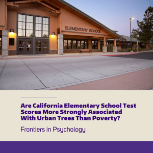 A photo of a generic elementary school building with lots of pavement and few trees