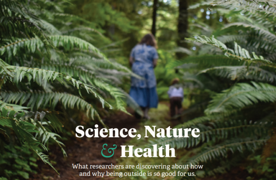 Words in white: Science, Nature & Health against an image of a hiker in a rainforest