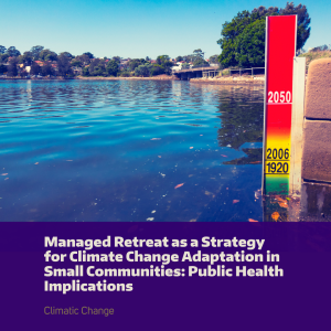 A marker in the sea showing sea level throughout time and projected sea level rise through 2050.