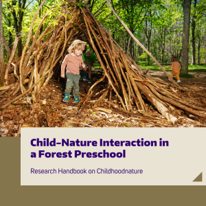 Preschoolers play in a structure made from sticks in the forest