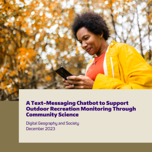 A person text messaging in a forest 
