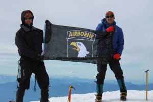 Members of the Hound Summit Team stand atop Mount Baker during the group’s first successful summit in 2011. Photo Courtesy: Josh Brandon
